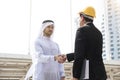 Businessman arabic with engineer making handshake agreement. Royalty Free Stock Photo