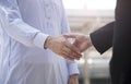 Businessman arabic with engineer making handshake agreement. Royalty Free Stock Photo