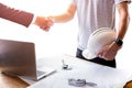 Businessman and Architect engineer shaking hands teamwork success concept Royalty Free Stock Photo