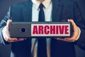 Businessman with archive files in document ring binder Royalty Free Stock Photo