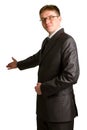 Businessman with arm out in a welcoming gesture Royalty Free Stock Photo
