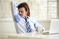 Businessman, armpit and sweat smell at work for company employee stress, stink hygiene or bad stain. Male person, laptop