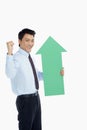 Businessman with an arrow, cheering