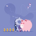 Businessman as a charmer of rats conjure money to piggy bank-Save money concept