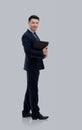 Businessman from the back - looking at you over a white backgrou Royalty Free Stock Photo