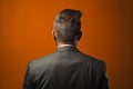 Businessman back portrait on orange background. Generate ai
