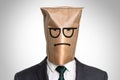 Businessman with a bag on the head - with sad face Royalty Free Stock Photo
