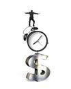 Businessman balancing on alarm clock and dollar sign Royalty Free Stock Photo