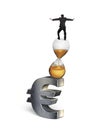 Businessman balancing on hourglass and euro sign