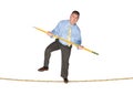 Businessman balancing on tightrope