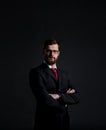 Businessman with beard. Black background with copyspace. Royalty Free Stock Photo