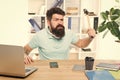 Businessman with beard and mustache gone mad with hammer in a hand. Angry aggressive businessman in office. Frustrated Royalty Free Stock Photo