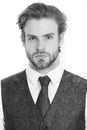 Businessman, bearded man or serious gentleman in waistcoat and t