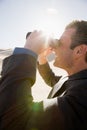 Businessman with binoculars