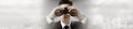 Businessman with binoculars. Royalty Free Stock Photo