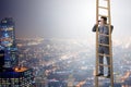 The businessman with binoculars looking into future Royalty Free Stock Photo