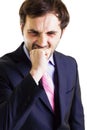 Businessman biting his fist. Frustration and failure. Royalty Free Stock Photo