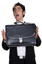Businessman with black leathern case. Royalty Free Stock Photo