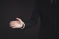 Businessman in black suit open hand for shaking hands Royalty Free Stock Photo