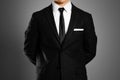 Businessman in a black suit, white shirt and tie. Studio shooting Royalty Free Stock Photo