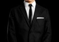 Businessman in a black suit, white shirt and tie. Studio shooting Royalty Free Stock Photo