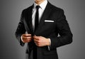 Businessman in a black suit, white shirt and tie. Studio shooting Royalty Free Stock Photo