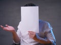 Businessman with Blank Paper Mask Covering His Face Royalty Free Stock Photo