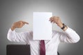 Businessman with Blank Paper Mask Covering His Face Royalty Free Stock Photo