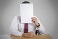 Businessman with Blank Paper Mask Covering His Face Royalty Free Stock Photo
