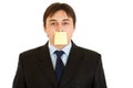 Businessman with blank sticky note on his forehead Royalty Free Stock Photo