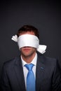 Businessman blindfolded