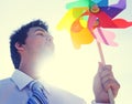 Businessman Blowing Wind Summer Power Energy Concept