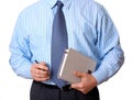 Businessman in blue shirt with appointment book and pen