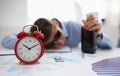 Businessman in blue shirt asleep at work on the Royalty Free Stock Photo