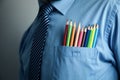 Businessman in blue shirt with colorful pencils in pocket Royalty Free Stock Photo