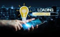 Businessman holding loading sketch over mobile phone
