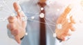 Businesman using flying network balls connection 3D rendering
