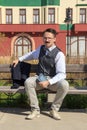 Businessman with a book sitting on the bench Royalty Free Stock Photo