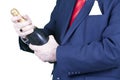 Businessman with a bottle of champagne. Royalty Free Stock Photo