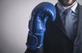 Businessman in boxing glove. Business, Power, Sport