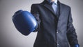 Businessman in boxing gloves. Business, Power, Sport