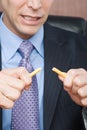 Businessman breaking pencil Royalty Free Stock Photo