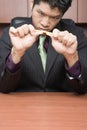 Businessman breaking pencil Royalty Free Stock Photo