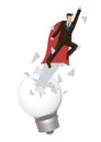 Businessman breakout from light bulb