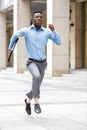 Businessman with briefcase running Royalty Free Stock Photo