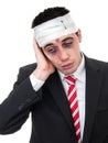 Businessman with bruised eyes and head Royalty Free Stock Photo