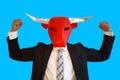 Businessman with bull mask flexing his muscles