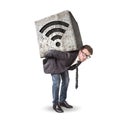 Businessman burdened by a heavy stone with a wifi icon on his back