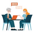 A businessman and businesswoman engaged in a productive discussion at a desk with laptops, exchanging ideas Royalty Free Stock Photo