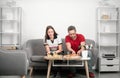 BusinessMan and businesswoman having a lunch break at office, eating a slice of pizza. Royalty Free Stock Photo